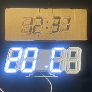 Digital alarm clock (tells temp,date and time)